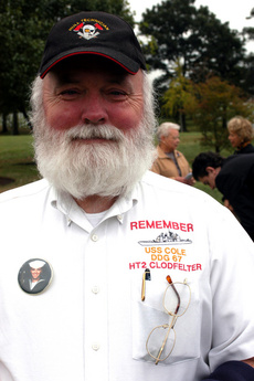 HT2 Kenneth E. Clodfelter 2 John Clodfelter wears a shirt commemorating the USS Cole and his son, <br> Petty Officer 2nd Class Kenneth E. Clodfelter, who was killed in the <br> Oct. 12, 2000, terrorist attack on the guided missile destroyer. <br> Photo by Rudi Williams